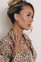 Model wearing the Mira Drop Earrings with Mira Charms