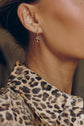 Model wearing the Mira Drop Earrings with Mira Charms