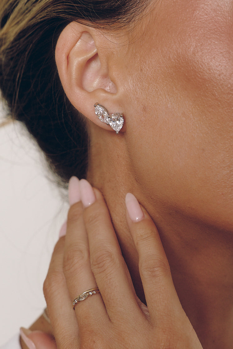 Model wearing the Esme ear climber earrings